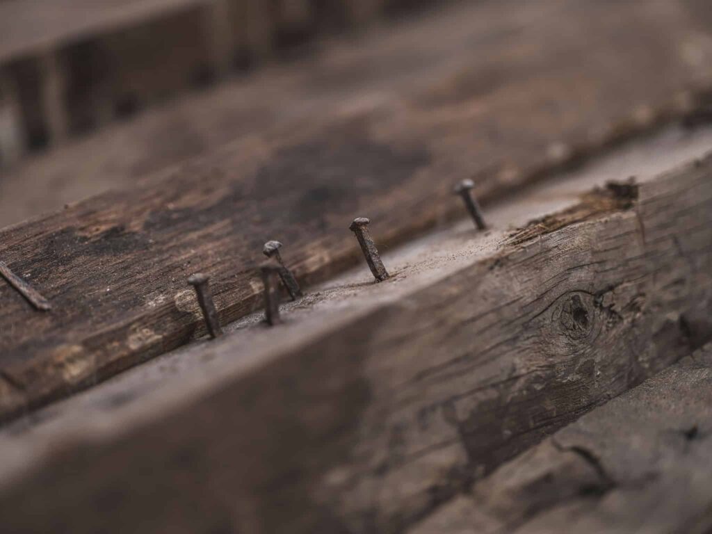 old hand-forged nails in old children's beams